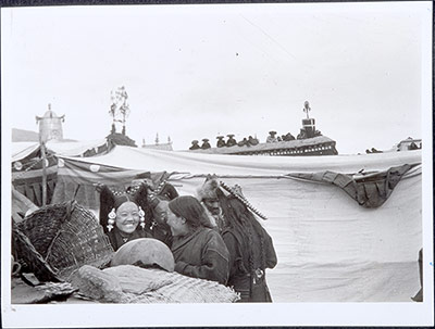 Women and men on a roof top in Lhasa