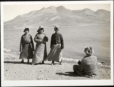 Tibetan officials and Gould beside Yamdrok Tso