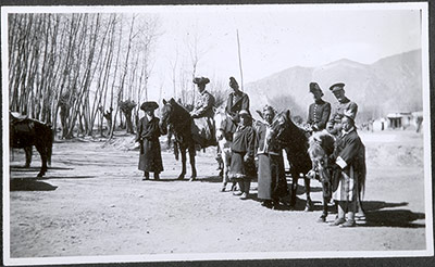 Officials of the British Mission on horseback