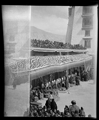 Spectators and drummers in courtyard of Potala Palace