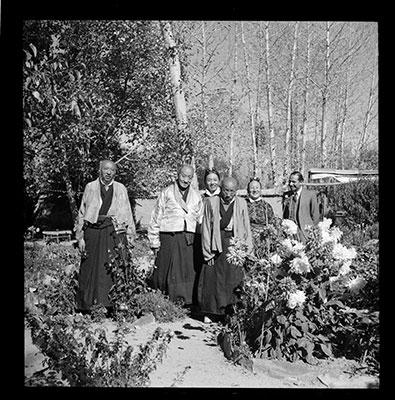 Monk and lay officials in the garden of Dekyi Lingka