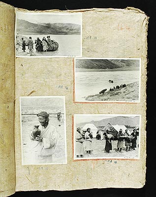Boat in water and men standing by