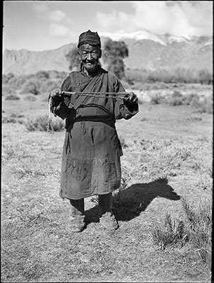 Tibetan shepherd with sling