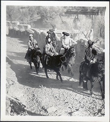 Officials riding up to Potala at New Year