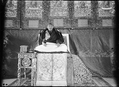 The Thirteenth Dalai Lama on  throne in Norbu Lingka