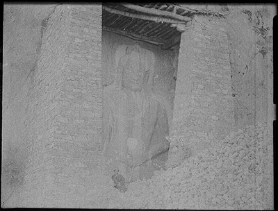 Buddha figure carved into a rock near Lhasa