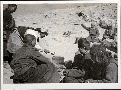 Travellers at rest preparing food