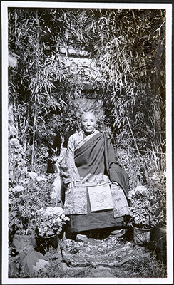 The Nechung Oracle, Lobsang Namgyal, seated on a chair