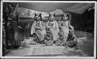 Seated aristocratic women with children at their feet