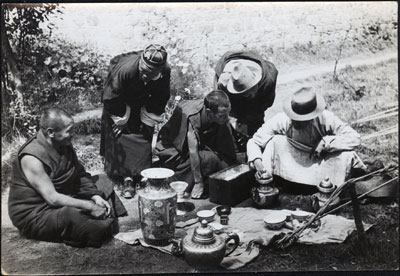 Monks selling curios to Mission staff