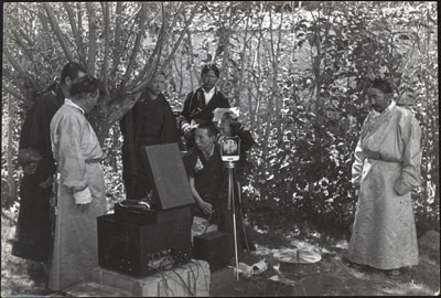 Reting Rinpoche, Norbhu and Tsarong with microphone