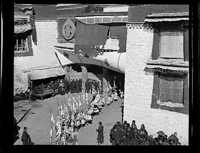 Monk escort of Nechung Oracle leaving Jokhang