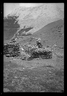 Two cairns bedecked with prayer flags at Karo La