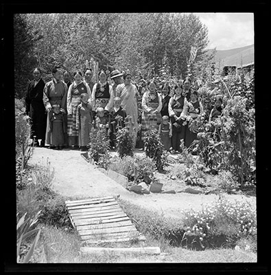 Guests at a reception in the garden of Dekyi Lingka