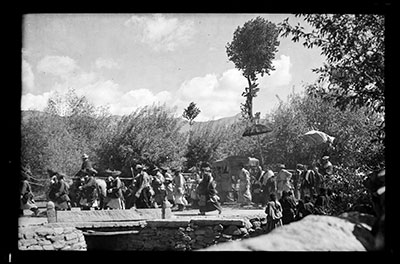 Dalai Lama's sedan chair in procession from Potala