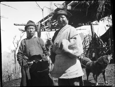 Dog and Khampa men in camp near Yatung