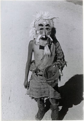 Boy in mask begging