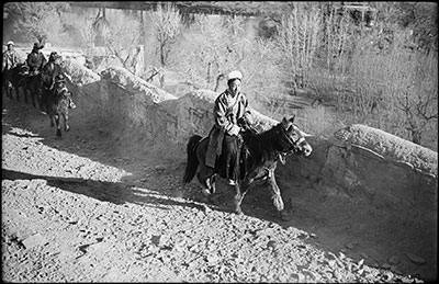 Officials riding up to Potala at New Year