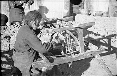 Tibetan woman weaving