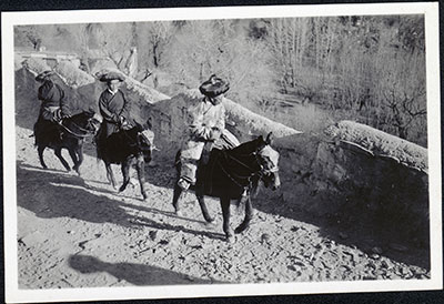 Tsarong riding up to Potala at New Year