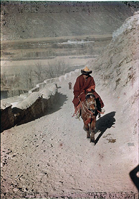 Monk official riding to Potala at New Year