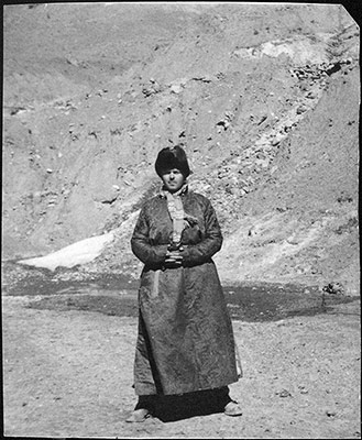 Harry Staunton dressed in a Tibetan coat and fur hat.