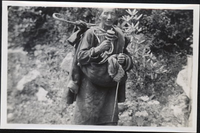 Monk with prayer wheel