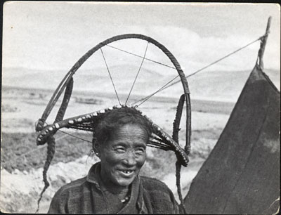 Woman in hooped headdress near Kala