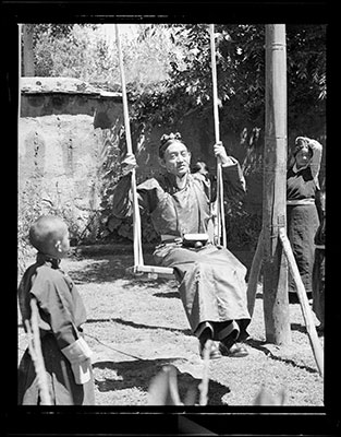 Tsarong Dundul Namgyal on a swing