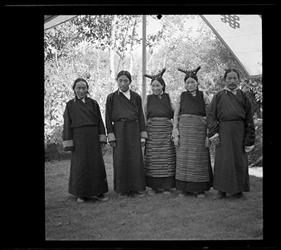 Lhalu's servants standing beneath a tent