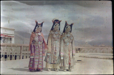 Three Yaso maids of honour on roof of Tethong house