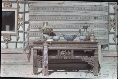 Tibetan objects on display on a table at Dekyi Lingka