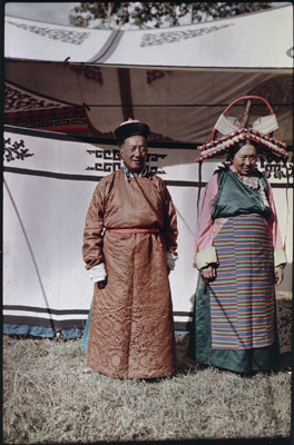 Raja and Rani Taring standing in front of tent