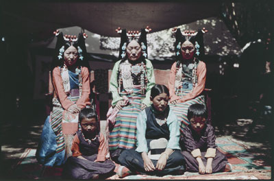 Three Kapshopa ladies and three children at a reception