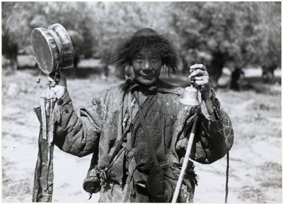 Itinerant monk with bell and skull drum