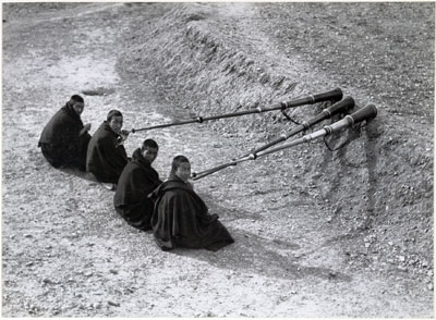 Monks practising playing radung